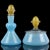 Beautiful vintage set of Murano hand blown blue ribbons and gold flecks Italian art glass vanity set. The perfume bottle...