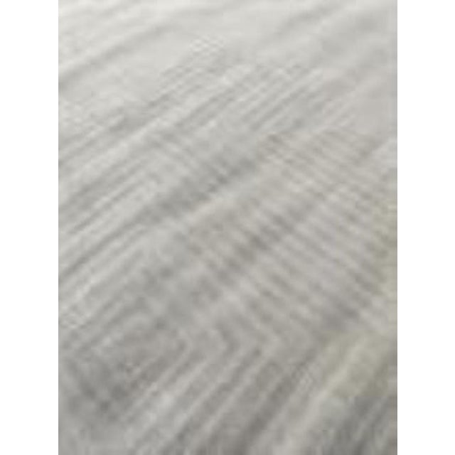 Beautiful hand knotted modern rug. Made of 75% wool and 25% cotton with very modern design and colors, this extremely...