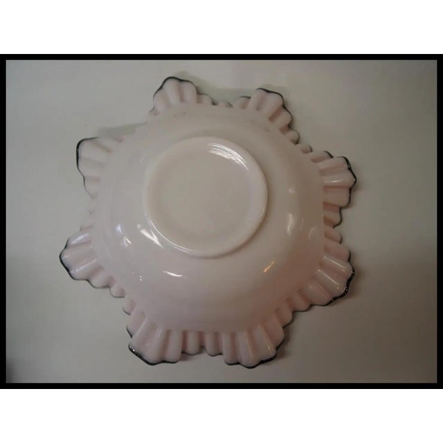 Elegance in an understated fashion. This beautiful late 19th century bride's basket is made from quadruple plate silver,...