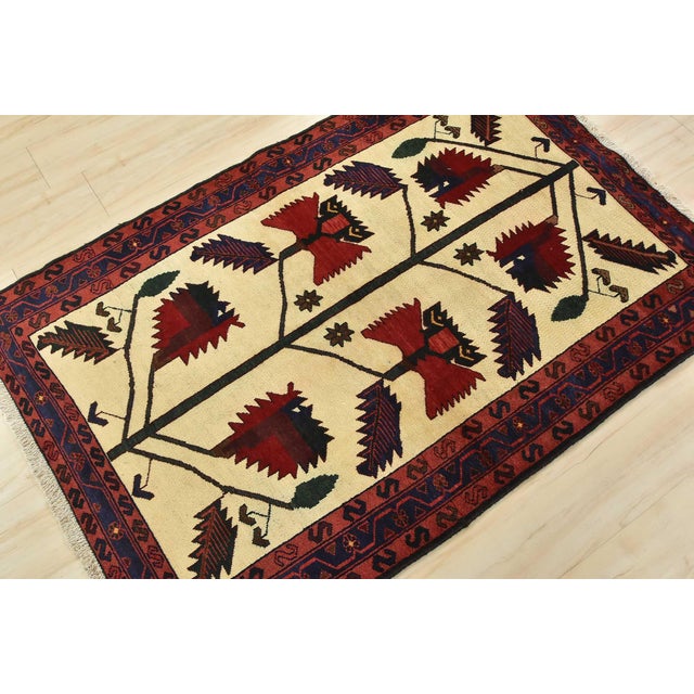 An authentic vintage tribal Zanjan rug hand-knotted with fine wool and natural dyes. This nomadic oriental rug features an...