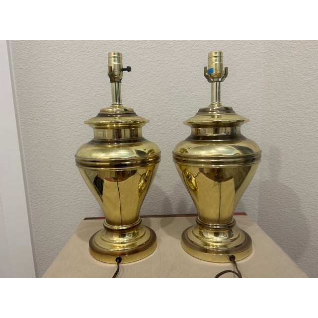 Gorgeous 1980's Large Brass Ginger Jar Lamps. Any room could use a splash of sunshine, electric or not. These brass lamps...