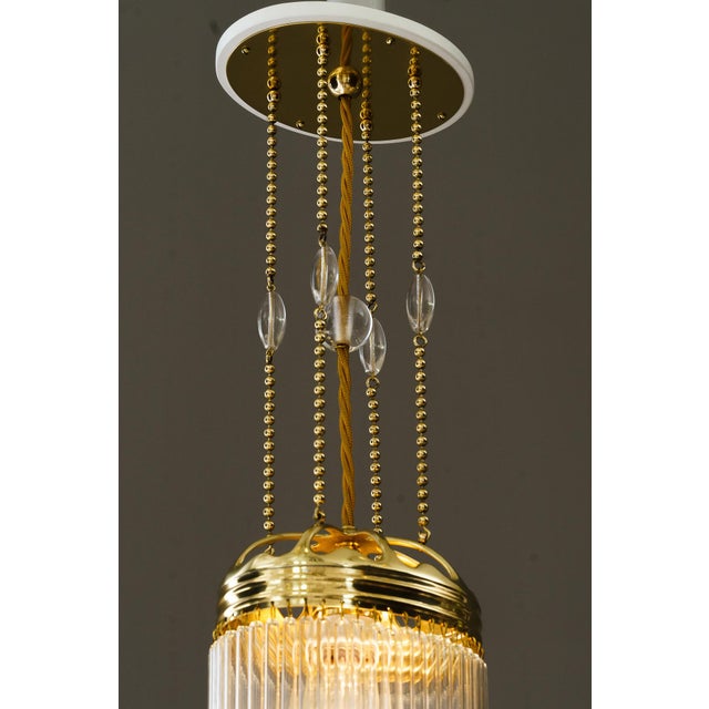 2x Oval Art Deco pendant vienna around 1920s Brass polished and stove enameled The glass sticks are replaced ( new ) Up to...