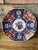 An elegant Japanese Imari porcelain charger plate dating to the Mid 20th Century. Markings on the back. This gorgeous hand...
