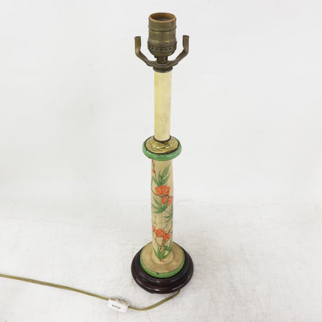This elegant vintage candlestick lamp features a slender, hand-painted wooden body adorned with a delicate Chinoiserie-...