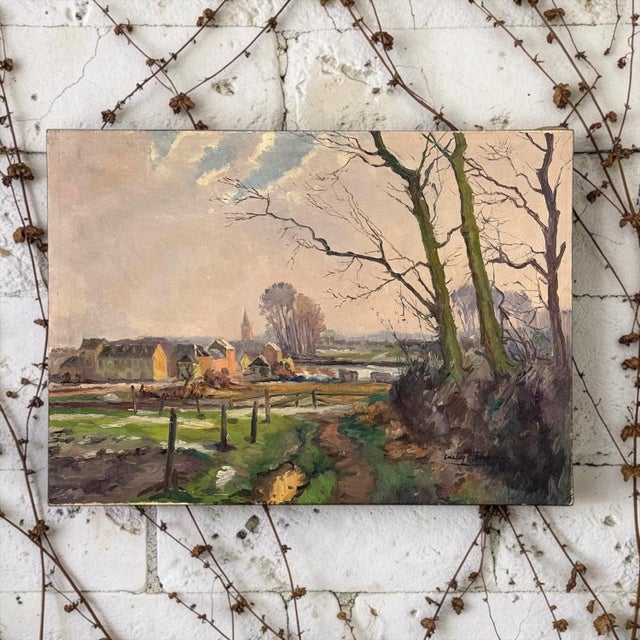 A Belgian oil on canvas by Victor Fermans, painted at the quiet turn from winter to spring, when the last snow still...