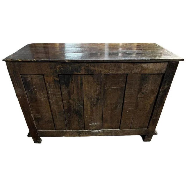 Louis xiii period burgundian sideboard in solid oak and walnut circa 1680. front opening with 2 leaves and 3 drawers, all...