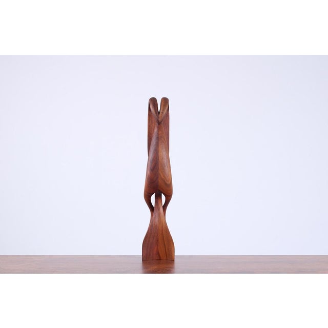 Captivating midcentury biomorphic sculpture, seamlessly blending organic forms with abstract design. This sculpture will...