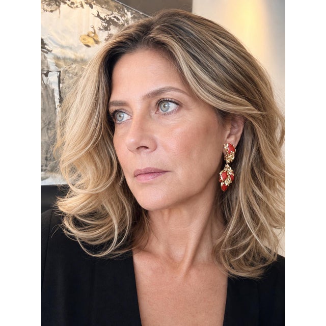 A dramatic pair of Italian drop earrings dating to circa 1960, crafted in richly textured 18-karat yellow gold and set...