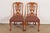 An outstanding pair of antique Georgian, Chippendale, or Queen Anne style side chairs or dining chairs By Romweber USA,...