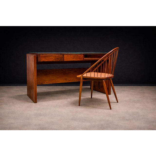 Designed by Joaquim Tenreiro (1906–1992) in 1961–1962, the Curva chair is one of the designer’s most refined and...