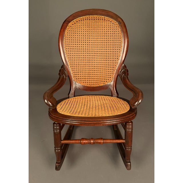 Add timeless Victorian elegance to your home with this antique American Victorian walnut side chair, dating to circa 1880....