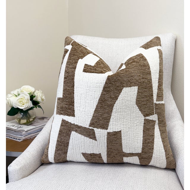 This pillow cover features a bold, modern pattern in latte beige and ivory chenille, offering a perfect mix of structure...