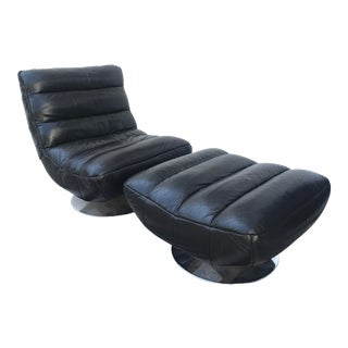 Mid-Century Swiveling Leather Lounge Chair and Ottoman For Sale