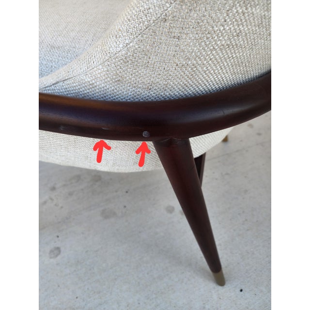 Great looking pair of curved back upholstered chairs with rounded wood details .