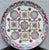 Presenting a vintage chinoiserie style decorative plate in beautifully unexpected colors. It is decorated in celadon...