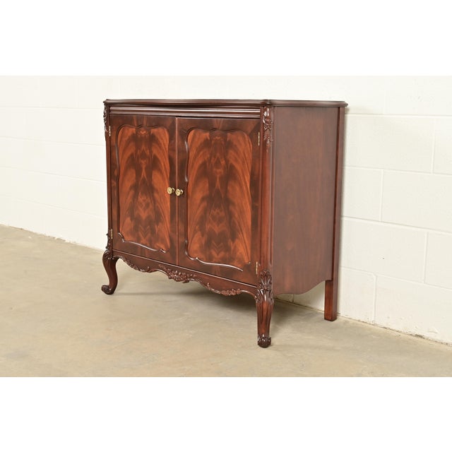 An exceptional antique French Provincial Louis XV style buffet server or bar cabinet By Romweber USA, Circa 1920s Gorgeous...