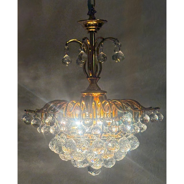 Brass and Crystal Ball 4-Light Chandelier, 1980s, in Very Good conditions. Designed 1980 to 1989 I have official proof of...