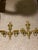 A pair of bronze Caldwell sconces