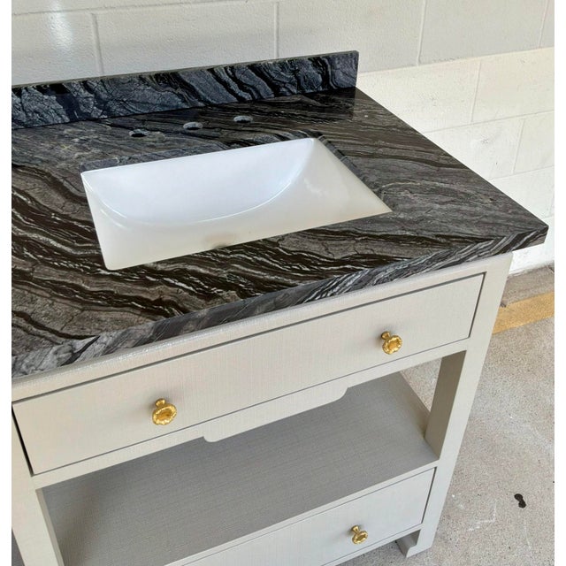 Original retail $9760, stylish Made Goods Modern Gray Linen Double Sink Vanity, black marble top, showroom floor sample