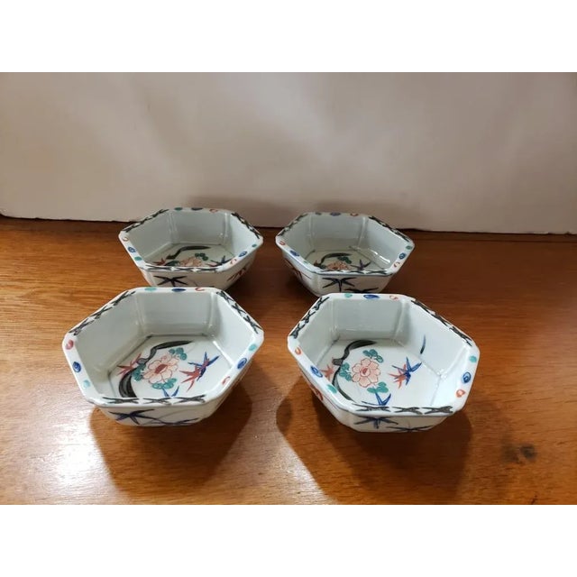 Up for sale is a Set of 4 Circa 1920 Japanese Kakiemon Porcelain Floral/Bird Motif Hexagonal Bowls. Each bowl measures 1...