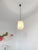 An authentic cylindrical pendant light, radical, modernist, fifties, minimalist, diffusing white perspex cylinder...