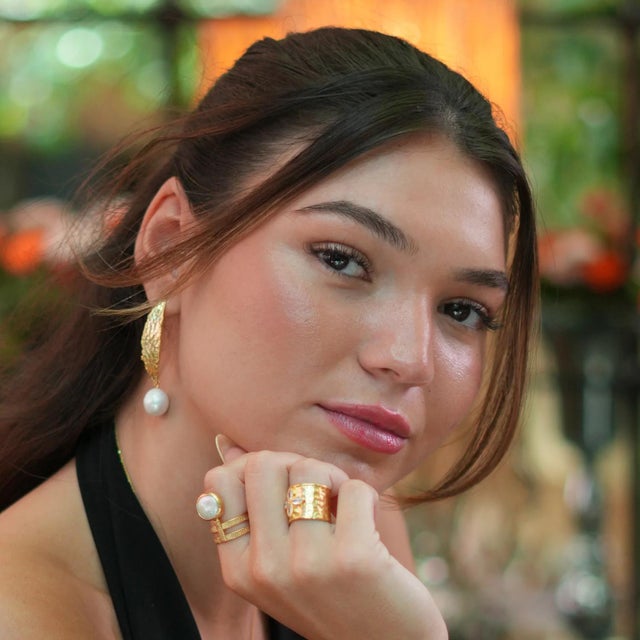 Add a bold touch to your style with our Chunky Gold Hook Baroque Pearl Drop Earrings. Featuring 24k gold-plated chunky...