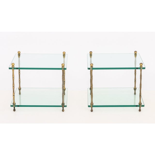 Pair of Modern Faux Bamboo Brass and Glass Side Tables. 16.25" H x 18" W x 18" D. Provenance: From a Central Park South...