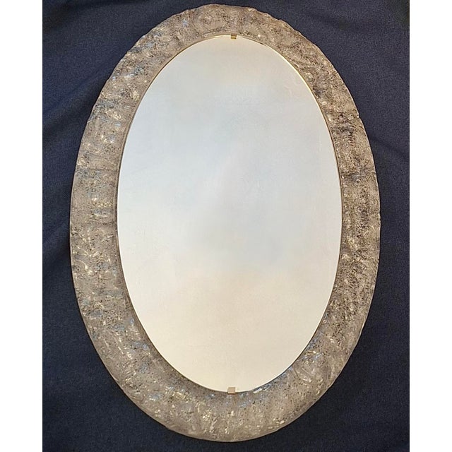 Large Erco mid century melted ice effect illuminated oval wall mirror / wall light dating from about 1970. Erco label on...