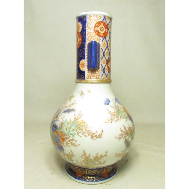 Japanese Imari porcelain vase, c.1930’s A very fine painted Imari vase with delicate flowers and leaves. Also note the...