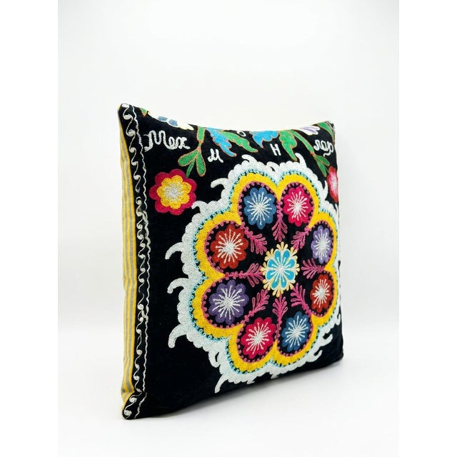This beautiful 17'' x 18'' hand-embroidered Suzani pillow cover was made from authentic Uzbek cotton fabric. The intricate...