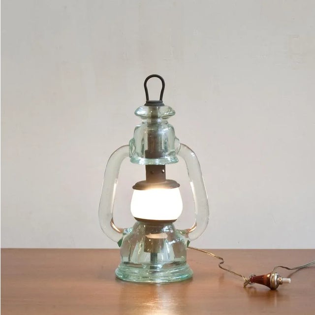 Rare hand-blown small table lamp made of clear glass from Murano Seguso Italy. The small diffuser is made of frosted...