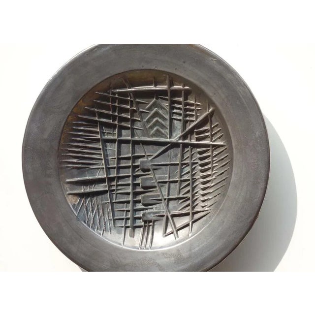 Sculpture plate Arnaldo Tomato Rossicone Ceramics, Milan 1982 Luster effect ceramic Exemplary 30/50 Artist's signature on...