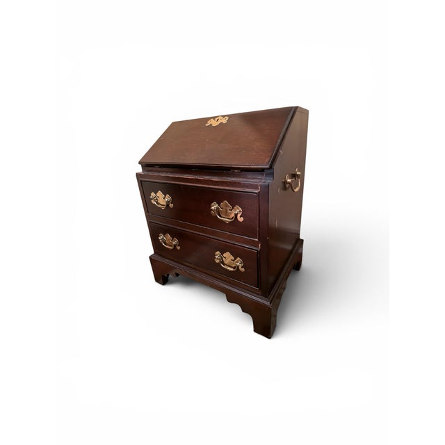 Mahogany Chippendale style child/salesman's slant front sample desk. Makes a great end table or nightstand. Some wear as...