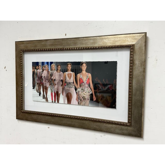 Design Plus Gallery presents a Framed Fashion Show Print. The line up of models were walking for Vera Wang's Spring/Summer...