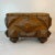 Vintage Home is pleased to present this Antique Tramp Art Footstool. Everything is original on this piece. It features...