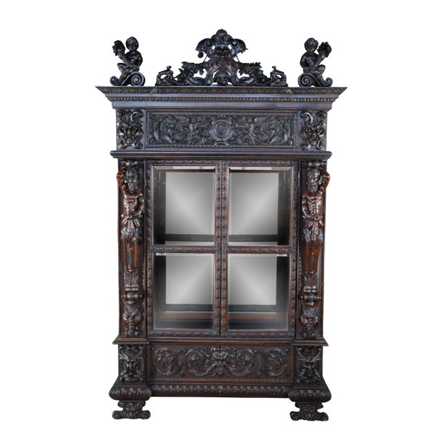 A monumental, rare and exceptional pair of mid19th Century Italian Renaissance china display cabinets. Drawing inspiration...