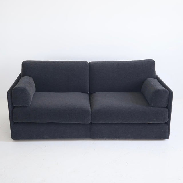 c. 1970s, Switzerland, in excellent condition. This piece has been fully reupholstered in a 100% alpaca fabric. It also...