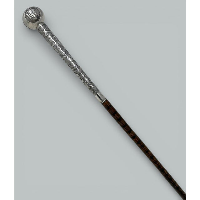 Very Stylish Fine Quality polished banded dark brown Malacca Chinese Qing Lady’s or Gentleman’s Walking Cane with a highly...