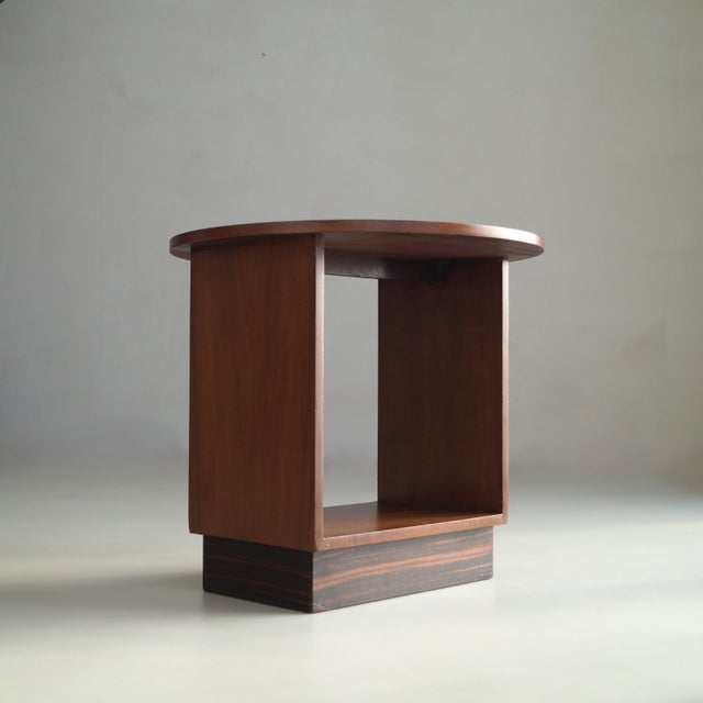 This striking modernist table embodies the disciplined elegance of the Hague School. Architectural in form and carefully...