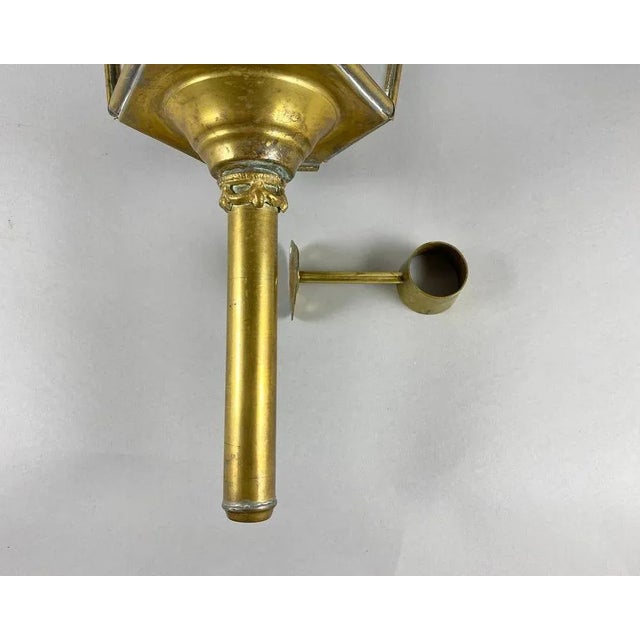 Antique brass carriage lamp, made in Belgium, circa 1920. The huge carriage lamp is adorned with decorative crowns and an...