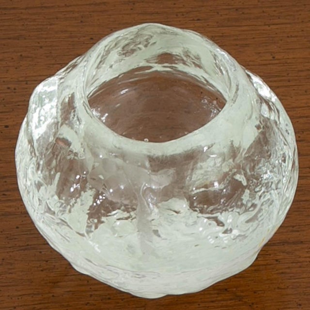 Pair of Kosta Boda "snowball" candle votives. Made from clear textured glass. Unmarked.
