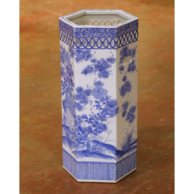 This mid-century blue and white porcelain umbrella stand was crafted in China and acquired in France. The tall hexagonal...