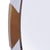 The CB2 Demi Round Mirror with Acrylic and Brass Accents offers a sleek, modern take on a classic form. Its circular...