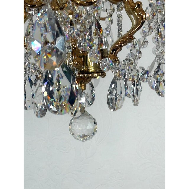 Brass and Lead Crystal Chandelier from Palwa, 1960s, in Very Good conditions. Designed 1960 to 1969 This piece has an...