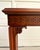 This elegant mid-century console table is crafted in the Chinese Chippendale style and features a beautifully proportioned...