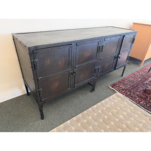 Design Plus Gallery presents an Industrial Tool Chest Sideboard from Restoration Hardware. This handcrafted iron piece...