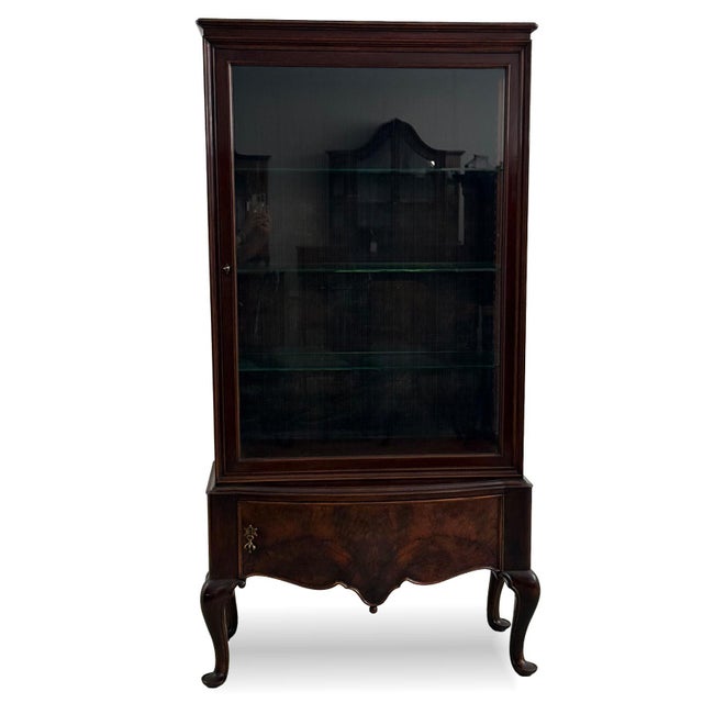An elegant display cabinet from the 1930s, made in the style of Gerstel, one of the leading Czechoslovak furniture...