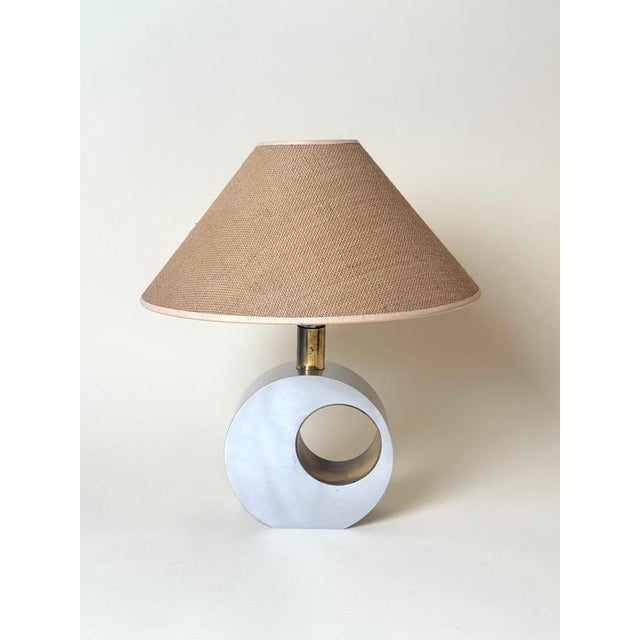 A striking example of italian modernist design, this rare sculptural table lamp by banci firenze embodies the refined...