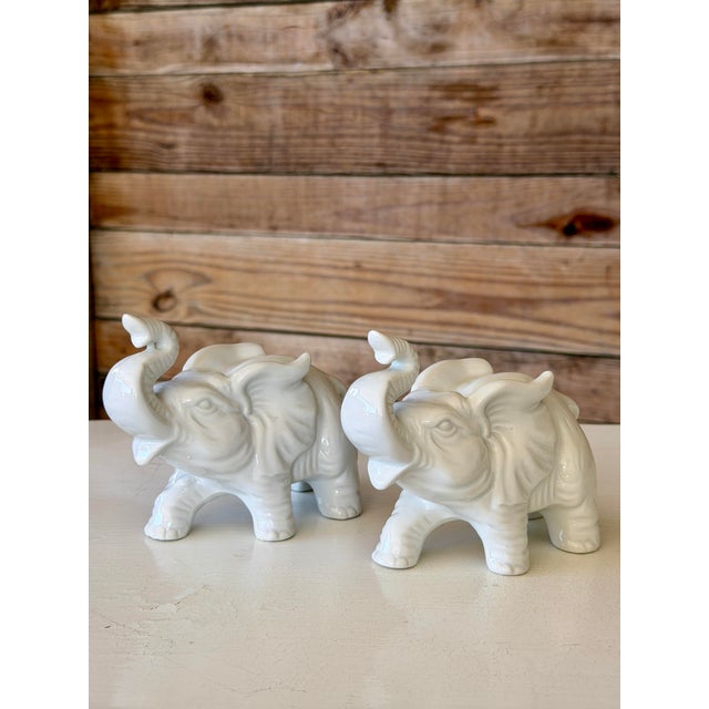 Charming pair of vintage white glazed ceramic elephant figurines by INARCO (International Art Ware Corporation, Japan)....