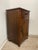 This vintage Welsh style end table cabinet features traditional carved detailing and a compact storage design suited for...